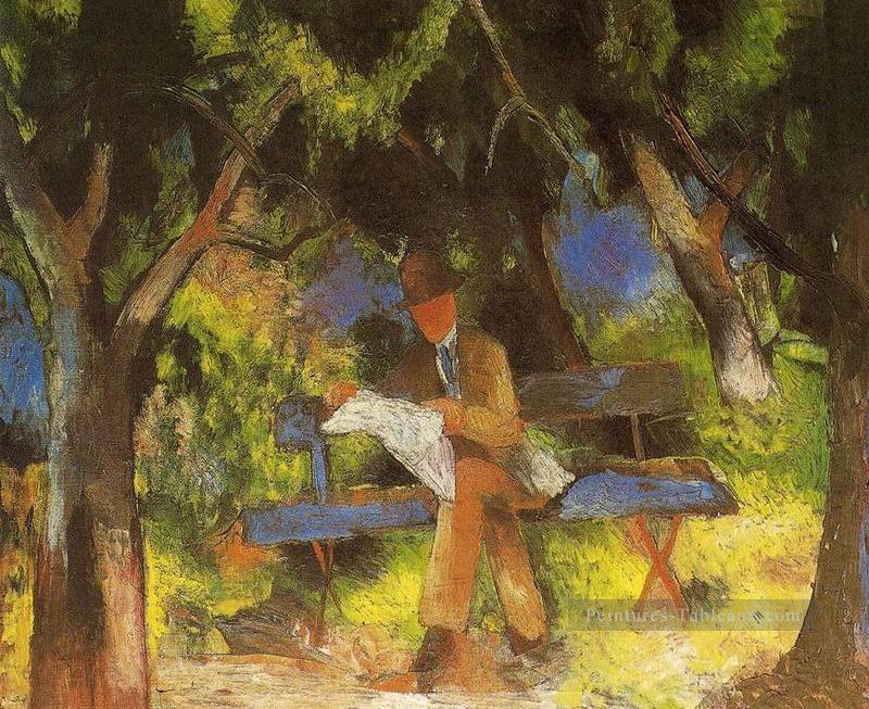 Homme lisant dans un parc Lesender Mannim Park August Macke Peintures à l'huile